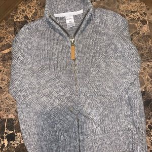 Zip down turtleneck sweater...